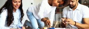 family creating art together in their home