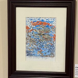 Lost Archipelago I" by Alexander Haas, a framed abstract piece with blue, orange & gray textures on a beige wall.