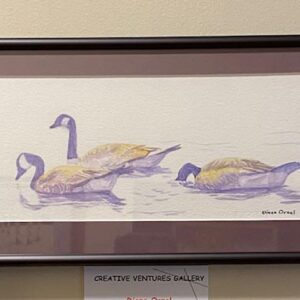 Quiet Time" by Diane Orzel, a framed watercolor of four geese swimming, displayed above a gallery label.