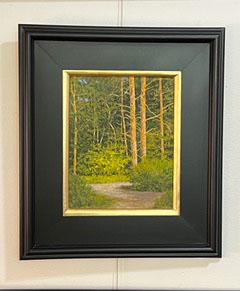 Late Afternoon" by James O'Donnell: Framed painting of tall trees, green foliage, and a dirt path in a forest scene.