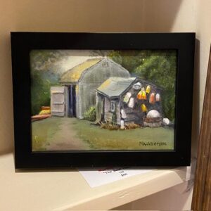 The Boat House" by Martha Wilkerson: framed painting of two small sheds with buoys in a lush green setting.